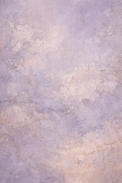Aesthetic grunge wallpaper with a washed weathered plaster wall texture in dusty lilac
