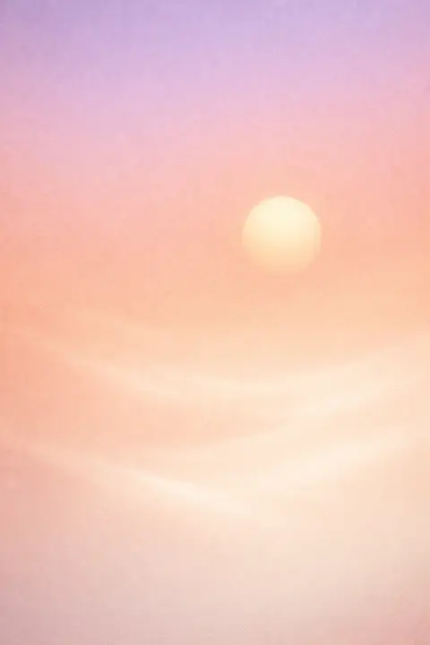 Aesthetic wallpaper with silky peach gradient and a soft minimal sun disc