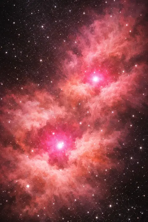 Pink space wallpaper with rose and coral star forming clouds and hot pink glowing cores