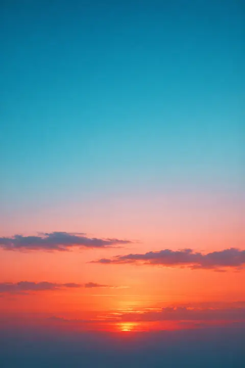 Sunset wallpaper grading from a cool teal sky down to warm coral at the horizon