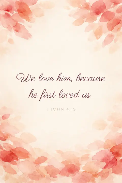 Bible verse wallpaper with 1 John 4:19 in script lettering over coral and blush watercolour petals