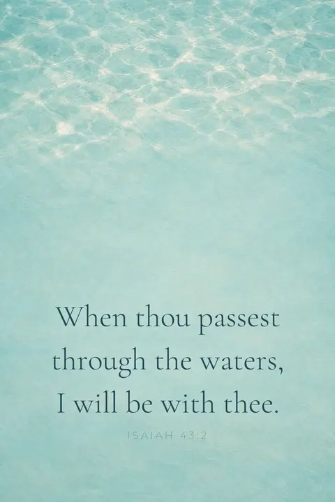 Bible verse wallpaper with Isaiah 43:2 in serif type over calm pale turquoise ocean ripples