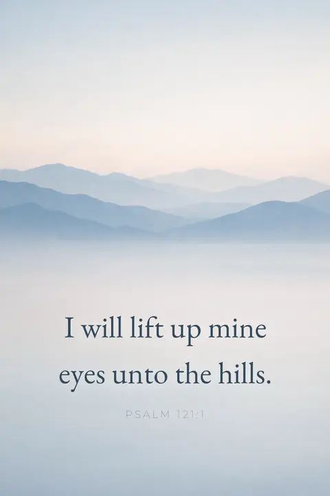 Bible verse wallpaper with Psalm 121:1 in serif type over layered blue mountain ranges fading into mist