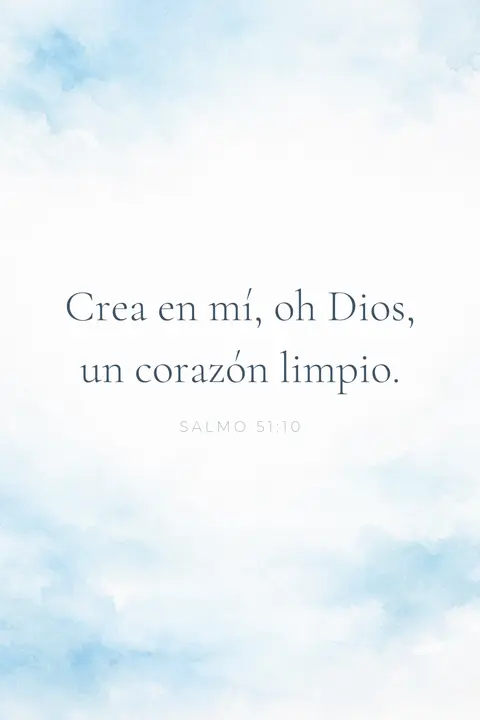 Fondo de pantalla cristiano con el Salmo 51:10 en tipografía serif sobre una aguada blanca y azul pálido